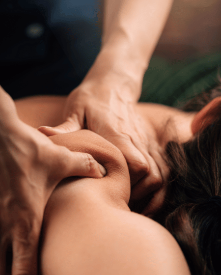 Deep Tissue Massage for Muscle Relief at Q1 Day Spa 16 Remedial massage therapist applying therapeutic pressure on a client's back to alleviate pain and improve circulation, highlighting the benefits of muscle recovery at Q1 Day Spa.